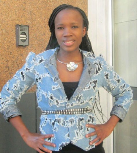 Ripped_denim_jacket_closeup_large